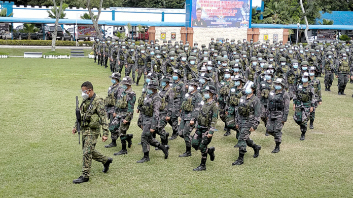 news-ruby-cops The 850 personnel of the Police Regional Office 6 during the send-off ceremony on Feb. 18. File Photo