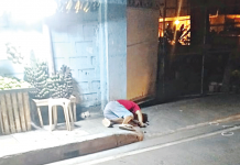 Drug surrenderer Agustin Odicta lies dead along the road in Barangay Tabucan, Mandurriao, Iloilo City on Feb. 18. CONTRIBUTED PHOTO
