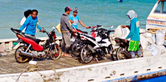 A cargo boat transports Boracay Island-bound motorcycles from mainland Malay, Aklan. PHOTO BY THE MALAY TRANSPORTATION OFFICE
