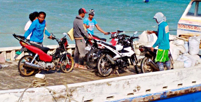 region-malay-impound A cargo boat transports Boracay Island-bound motorcycles from mainland Malay, Aklan. PHOTO BY THE MALAY TRANSPORTATION OFFICE