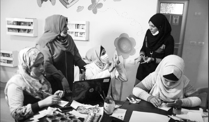 Gaza Hearing-impaired Palestinian women attend a lesson as they learn to make animation films. REUTERS/MOHAMMED SALEM