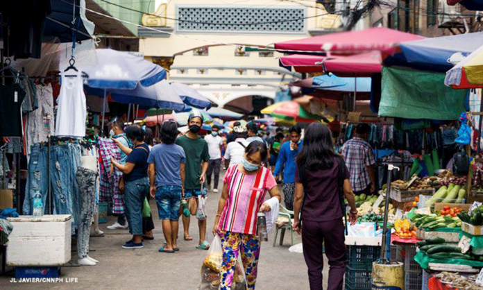 Nation-3-banner People scatter around to buy necessities in one of the markets in Metro Manila. Due to the rise in cases of coronavirus disease 2019, the Department of Health is pushing for an enhanced community quarantine extension in the “NCR Plus.” JL JAVIER/CNN PH LIFE