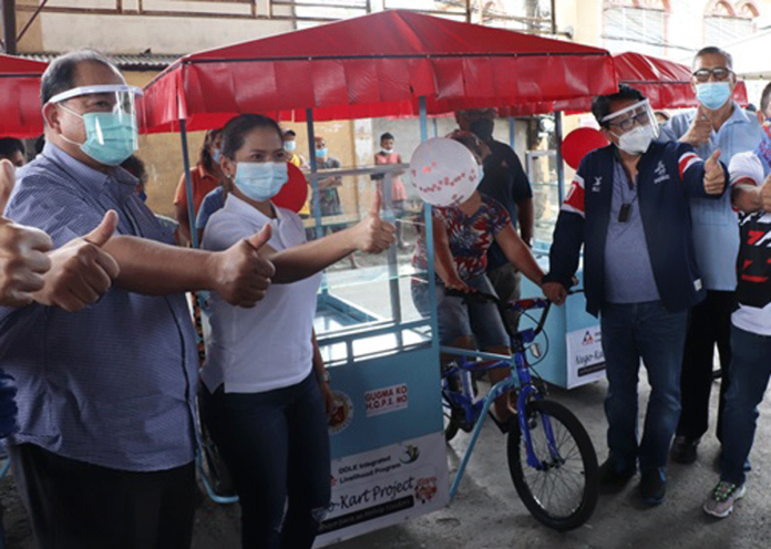 Secretary Silvestre Bello III (second from right) leads in the turnover of the NegoKart to the members of the informal sector at Desamparados, Jaro Gym in Iloilo City. In the photo are (left to right) Department of Budget and Management secretary Wendel Avisado, Iloilo City Rep. Julienne Baronda, DOLE-Regional Office No. VI assistant regional director Jesus Elpidio Atal, Jr. (partly hidden), and regional director Cyril Ticao. DOLE-VI Secretary Silvestre Bello III (second from right) leads in the turnover of the NegoKart to the members of the informal sector at Desamparados, Jaro Gym in Iloilo City. In the photo are (left to right) Department of Budget and Management secretary Wendel Avisado, Iloilo City Rep. Julienne Baronda, DOLE-Regional Office No. VI assistant regional director Jesus Elpidio Atal, Jr. (partly hidden), and regional director Cyril Ticao. DOLE-VI