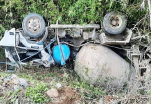 Truck ‘kills’ girl, ma This concrete mixer truck pinned the 33-year-old Dycel Malquerido and her eight-year-old daughter to death after it fell off a cliff in Barangay Bolo, Maasin, Iloilo yesterday. MAASIN MPS