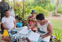 Barangay Captain Joewinny Giganto (left) of Barangay Calang, Dueñas, Iloilo was arrested yesterday, March 2. A grenade and a .45-caliber pistol loaded with seven live ammunitions were recovered from his possession. PRO-6