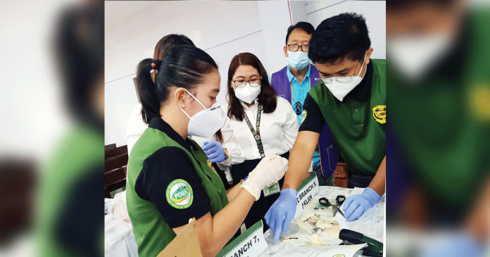 pdea-destroys-illegal-drugs Philippine Drug Enforcement Agency Region 6 personnel check these P12.5-million worth of confiscated illegal drugs before these are destroyed through thermal decomposition. RUBY SILUBRICO/PN
