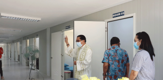 A priest blesses this 16-room quarantine facility built by the Department of Public Works and Highways for the provincial government of Guimaras at the capitol grounds in Barangay San Miguel, Jordan town. PHOTO COURTESY OF BUENAVISTA, GUIMARAS LGU