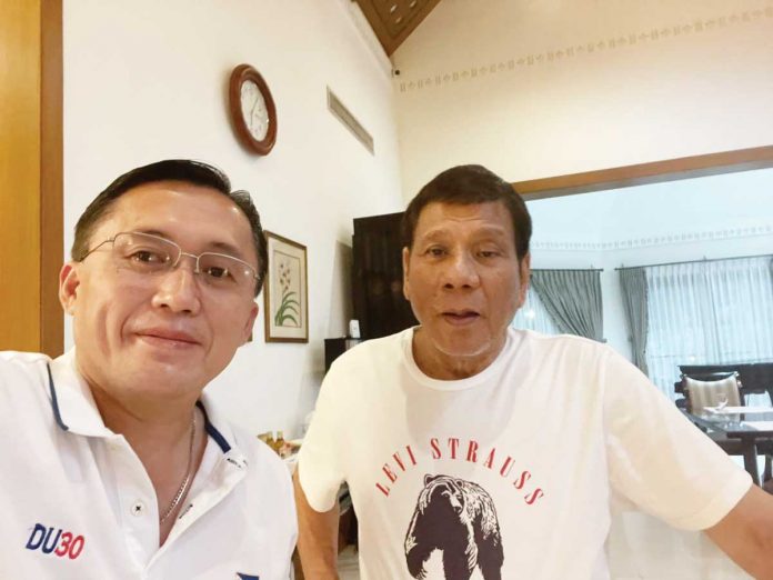 Nation-3-banner Senator Christopher "Bong" Go takes a selfie with President Rodrigo Duterte. He posted the photo online on Wednesday evening to show that Duterte is in good condition. BONG GO