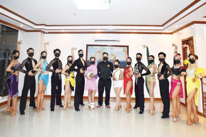 Sports-1-banner Dancers from the Iloilo City-based Matias Balbastro Dance Academy strike a post after they have showcased their wares during the First Annual Diamond Dancesport Competition 2021. CONTRIBUTED PHOTO