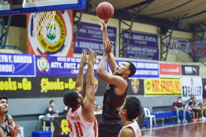 Sports-2 Jhaymo Eguilos escapes the defense of Dumaguete Warriors to shoot the ball for MJAS Zenith-Talisay City Aquastars on Tuesday night at the Alcantara Civic Center in Cebu. The Aquastars maintained its unblemished slate in the Pilipinas VisMin Super Cup. PILIPINAS VISMIN SUPER CUP.