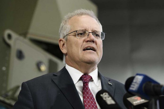 “Creating our own sovereign capability on Australian soil is essential to keep Australians safe,” says Prime Minister Scott Morrison on Wednesday. MORGAN SETTE/AAP IMAGE VIA AP