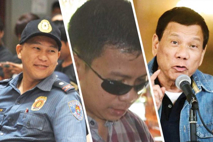 narco_cops Police Major Rio Maymay (left) and Police Lieutenant Colonel Ipil Dueñas (center) have been dismissed from the service. They were previously linked by President Rodrigo Duterte to illegal drugs.