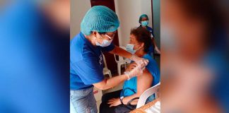 This senior citizen of Pandan, Antique receives her first shot of the vaccine against coronavirus disease 2019. PHOTO FROM THE FACEBOOK PAGE OF THE MUNICIPALITY OF PANDAN, ANTIQUE
