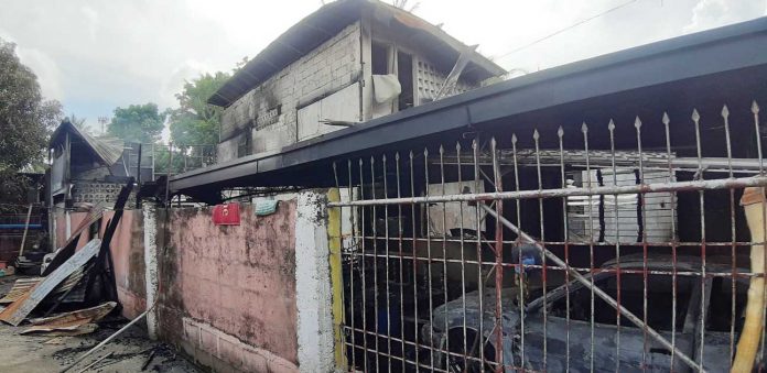 FRIDAY FIRE . A mother and son were killed in a fire that hit their home in Barangay Poblacion, Leganes, Iloilo yesterday. Authorities have yet to determine the cause of the blaze. JAP FAJARDO/PN FRIDAY FIRE . A mother and son were killed in a fire that hit their home in Barangay Poblacion, Leganes, Iloilo yesterday. Authorities have yet to determine the cause of the blaze. JAP FAJARDO/PN
