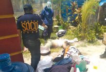 TANGUB MASSACRE; 4 family members found rotting in Bacolod ‘GRISLY SLAUGHTER’ Scene of the crime operatives secure the bodies of family members massacred in Barangay Tangub, Bacolod City. PHOTOS BY BCPO