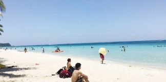 Boracay Island is experiencing a surge in coronavirus disease 2019 cases. A “superspreader” party at a bar there on March 10 is being blamed.