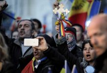 Marchers protest Romania’s COVID-19 restrictions