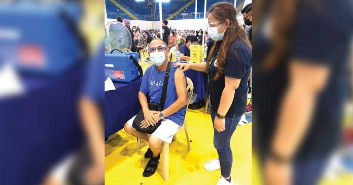 vaccination An elderly priest from St. Clement’s Church in La Paz, Iloilo City receives his initial dose of the CoronaVac vaccine against coronavirus disease 2019 at the Central Philippine University Gymnasium in Jaro district. ST. CLEMENT’S CHURCH- REDEMPTORISTS ILOILO