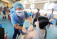 A frontliner from the Iloilo City Hall receives her second dose of the CoronaVac vaccine against coronavirus disease 2019. This week, the city government will inoculate its elderly and immunocompromised residents. ARNOLD ALMACEN/CMO