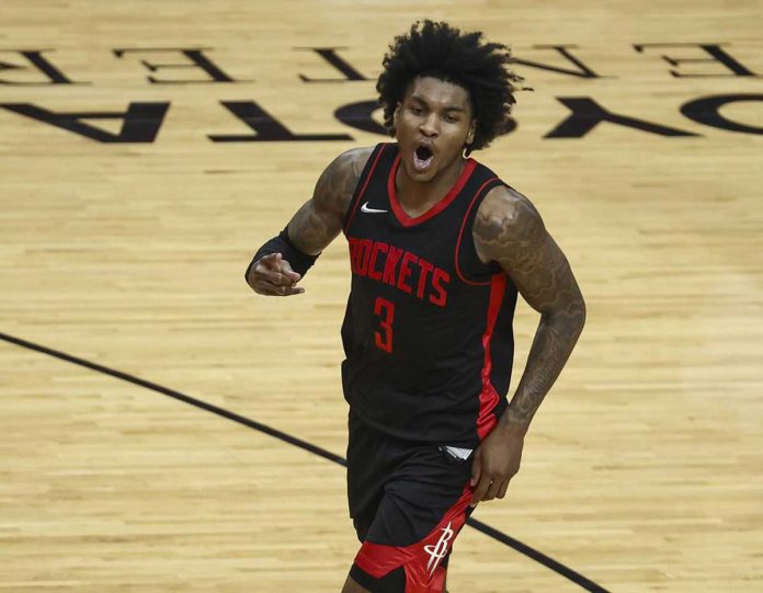 Porter-fires-50,-Houston-upsets-Milwaukee Houston Rockets' Kevin Porter Jr. is jubilant after scoring a basket in the fourth quarter of their basketball game against Milwaukee Bucks on Thursday. Porter finished the match with career-high 50 points. TROY TAORMINA/AP