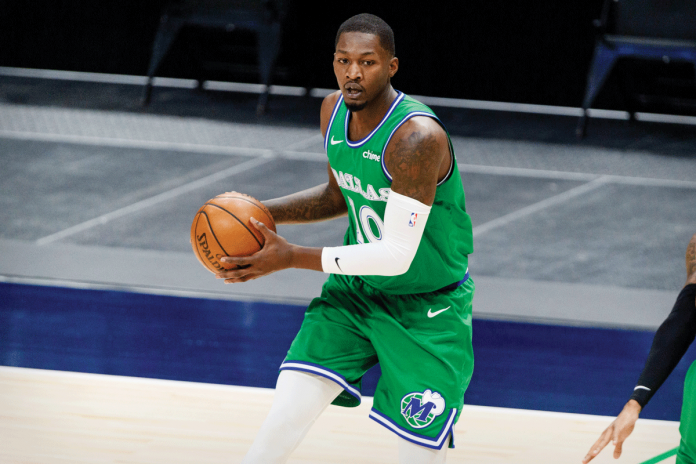 Sports-1 Dorian Finney-Smith scores a game-winning basket on Saturday night to help Dallas Mavericks escape with a 125-124 victory over Washington Wizards. USA TODAY