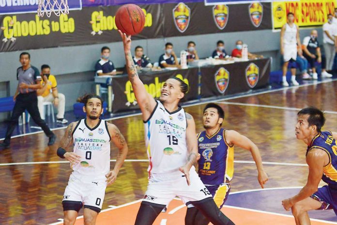MJAS Zenith-Talisay City Aquastars' Patrick Cabahug (19) goes for a layup against ARQ Builders Lapu-Lapu Heroes on Thursday during the 2021 Chooks-to-Go Pilipinas VisMin Super Cup in Cebu. PILIPINAS VISMIN SUPER CUP MJAS Zenith-Talisay City Aquastars' Patrick Cabahug (19) goes for a layup against ARQ Builders Lapu-Lapu Heroes on Thursday during the 2021 Chooks-to-Go Pilipinas VisMin Super Cup in Cebu. PILIPINAS VISMIN SUPER CUP