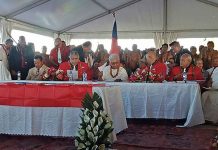 Samoa’s first female PM locked out of parliament Fiame Naomi Mata'afa (pictured center, in white) is sworn in at the makeshift ceremony. GETTY IMAGES