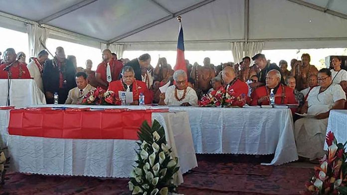 World-2 Fiame Naomi Mata'afa (pictured center, in white) is sworn in at the makeshift ceremony. GETTY IMAGES