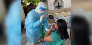 An Aklanon undergoes a nasal swab for coronavirus testing. Aklan, which is currently under modified general enhanced community quarantine, recorded 1,819 cases with 42 deaths since the start of the pandemic last year. PHOTO AKLAN PESU
