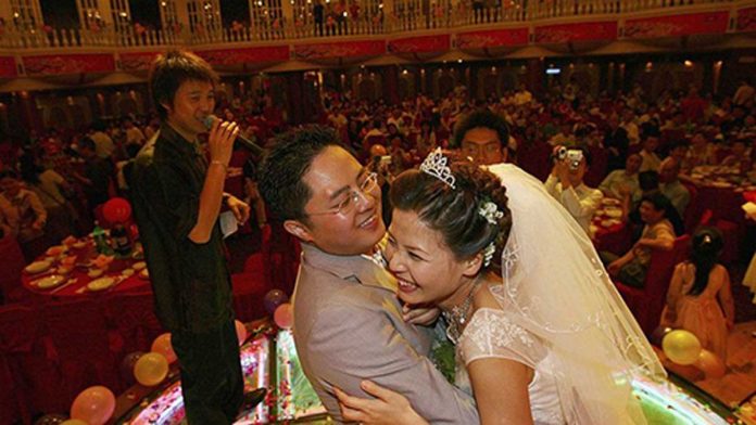 china Weddings are seen as key indicators of one’s social status in Chinese culture. GETTY IMAGES