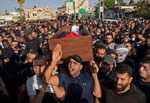 Israel declares city emergency A funeral is held for a man who died during an unrest in Lod, Israel. GETTY IMAGES