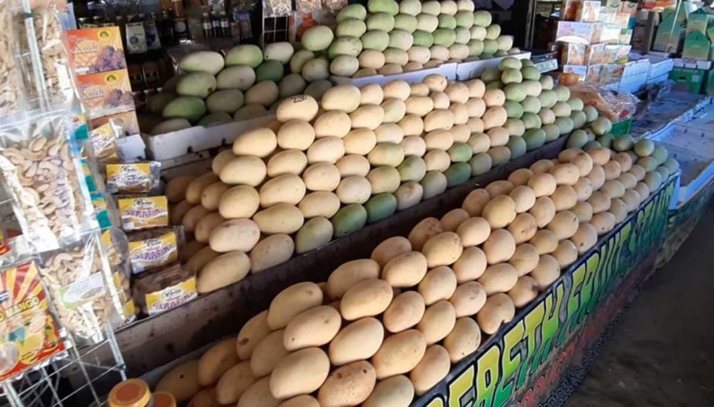 Mangoes are being displayed at a stall in Jordan, Guimaras. Mango growers say they had to slow down production amid the coronavirus pandemic. JAPHET FAJARDO/PN