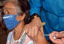 VACCINATION COMPLETE. An elderly woman gets her second dose of the Sinovac COVID-19 vaccine at the Pasay City West High School. More Filipinos are expected to be vaccinated with the arrival of more COVID-19 vaccine supplies in the coming months. PNA