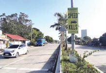 A road safety sign is prominently displayed along the national highway in Barangay Mali-ao, Pavia, Iloilo. The Sangguniang Panlalawigan is urging concerned authorities to put up more warning signs in accident-prone areas. Panay News Photo