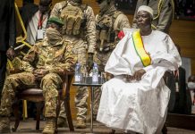 Mali’s military releases transitional prexy, PM In this file photo, retired Colonel Major Bah N'Daw (right) is sworn into the office of transitional president at a ceremony in Bamako, Mali. Mali's military has released the transitional president and Prime Minister Moctar Ouane from detention on Thursday after they resigned from their respective posts. AP