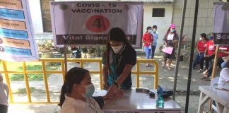 A frontliner gets her vital signs checked prior to vaccination against coronavirus in this vaccination center of Jorda, Guimaras. PHOTO FROM THE FACEBOOK PAGE OF MAYOR RUBEN CORPUZ