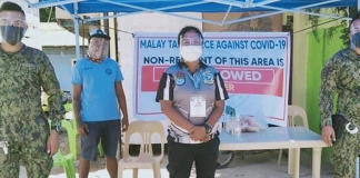 These frontliners make sure the surgical lockdown in Zone 5 of Barangay Manocmanoc in Boracay Island are being followed. Eight new cases of coronavirus disease 2019 were recorded in Zone 5 on April 29, according to the Municipal Health Office of Malay, Aklan. These pushed the total active cases to 28 in Zone 5. PHOTO MALAY AKLAN PNP