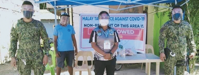 region-manoc-surgical These frontliners make sure the surgical lockdown in Zone 5 of Barangay Manocmanoc in Boracay Island are being followed. Eight new cases of coronavirus disease 2019 were recorded in Zone 5 on April 29, according to the Municipal Health Office of Malay, Aklan. These pushed the total active cases to 28 in Zone 5. PHOTO MALAY AKLAN PNP