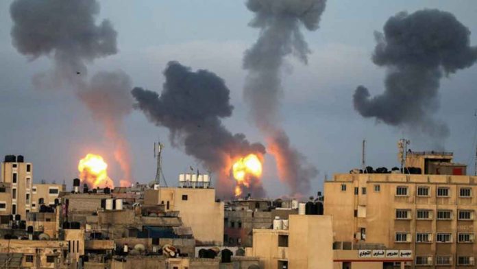 reuters Flames and smoke could be seen in Gaza. REUTERS
