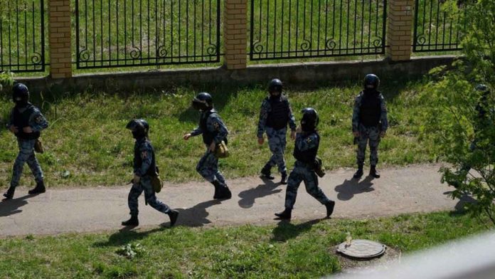 Armed police arrive at a school in Kazan, Russia where there has been a shooting. REUTERS