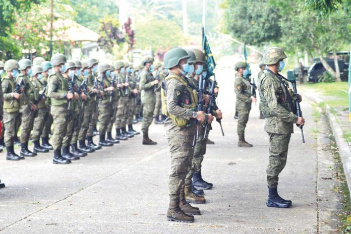 soldiers-recalled Soldiers of the Philippine Army’s 82nd Infantry Battalion formerly based in Miag-ao, Iloilo line up during a send-off ceremony in Barangay Pawak, Saguiaran, Lanao del Sur. They will be deployed to Cebu and Siquijor as augmentation force against insurgents there. PHILIPPINE ARMY