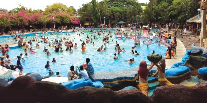 swimming Dozens of individuals, including children, are swimming in the pool of Gubat sa Ciudad resort in Caloocan City on Mother’s Day. PHOTO COURTESY OF BOY SANTOS, THE PHILIPPINE STAR