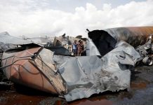 Large fuel truck fire in Afghanistan kills seven Men inspect wreckages of fuel tankers and trucks after an overnight fire, on the outskirts of Kabul, Afghanistan on May 2, 2021. REUTERS/MOHAMMAD ISMAIL