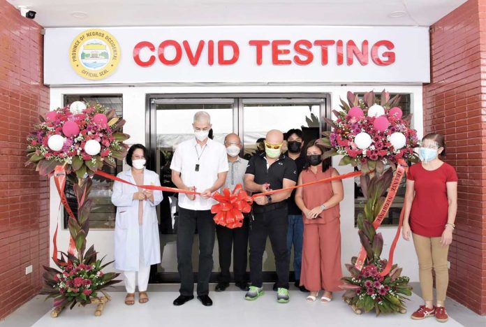 Gov. Eugenio Jose Lacson (second from left) leads the inauguration of Negros Occidental’s second COVID-19 Molecular Laboratory at the provincial government-run Valladolid District Hospital in Valladolid town. The facility will serve the towns and cities in southern Negros. COVID MOLECULAR LAB IN VALLADOLI