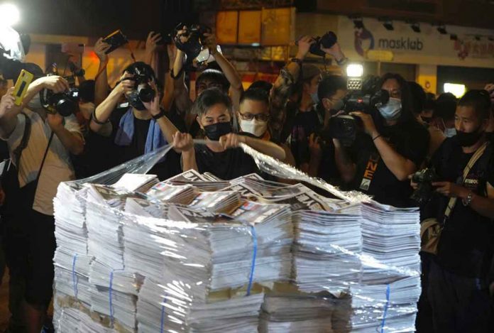 HK The last issue of Apple Daily arrives at a newspaper booth in Hong Kong, June 24, 2021. Apple Daily newspaper will stop publishing on Thursday, following last week's arrest of five editors and executives and the freezing of $2.3 million in assets under the city's year-old national security law. AP/VINCENT YU
