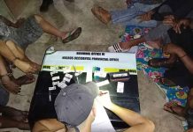 Authorities inventory the items recovered from drug suspects in Barangay 5, San Carlos City, Negros Occidental on June 13. PDEA-6