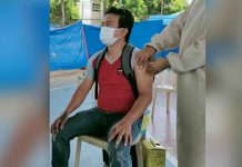 Residents of Bugasong, Antique, like 35-year-old Rian Villabueva receive their first dose of the COVID-19 vaccine. Around 1,000 Bugasongnons have been inoculated as of June 23. RHU-BUGASONG/FB