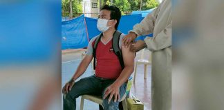 Residents of Bugasong, Antique, like 35-year-old Rian Villabueva receive their first dose of the COVID-19 vaccine. Around 1,000 Bugasongnons have been inoculated as of June 23. RHU-BUGASONG/FB
