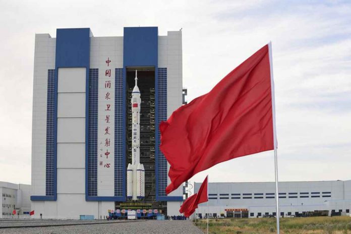 china-space-crew In this photo released by Xinhua News Agency, the Shenzhou-12 manned spaceship with its Long March-2F carrier rocket is being prepared at the launching area of Jiuquan Satellite Launch Center in northwestern China Gansu province, on Wednesday, June 9, 2021. WANG JIANGBO/XINHUA VIA AP