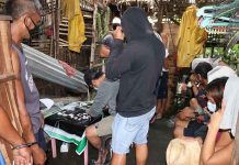 ‘Drug den’ dismantled; 9 arrested Operatives of the Philippine Drug Enforcement Agency in Region 6 inventory the items seized in an anti-drug operation in Barangay 5, San Carlos City, Negros Occidental on June 6. Nine persons were arrested. PHOTO BY PDEA-6